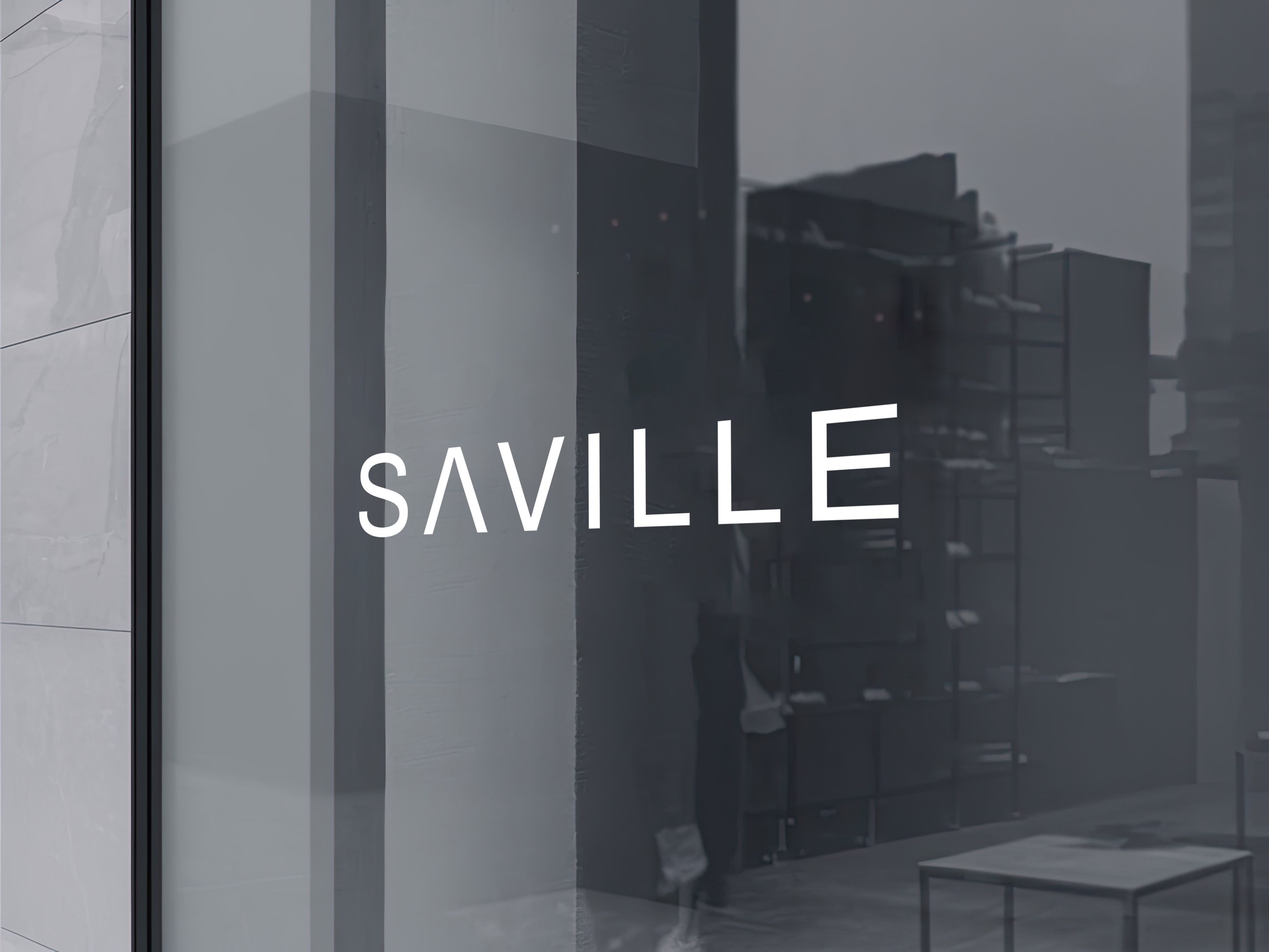 The Saville wordmark on the showroom glass