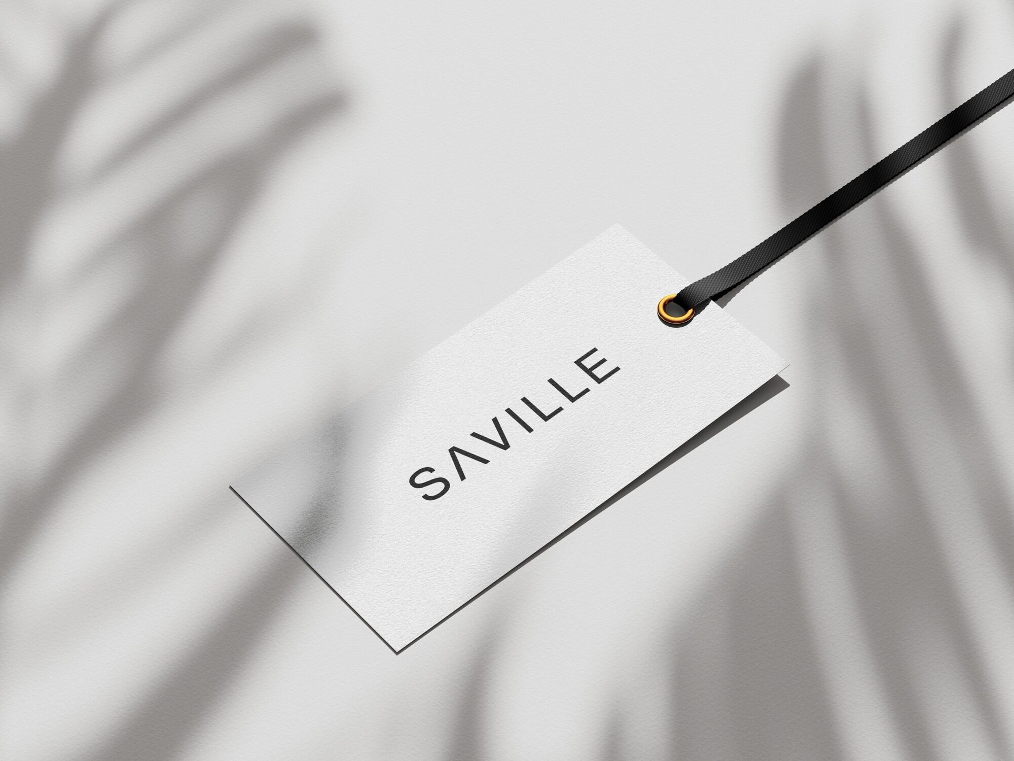 The SAVILLE logotype on a card
