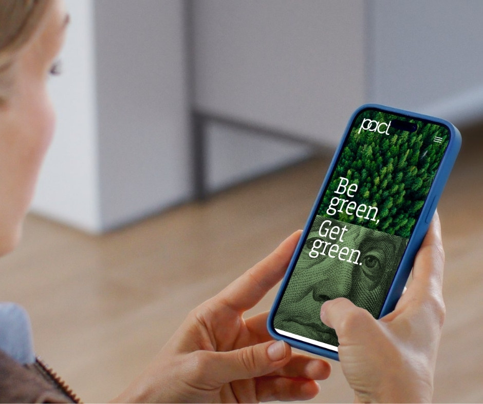 The PACT identity on a phone, held
